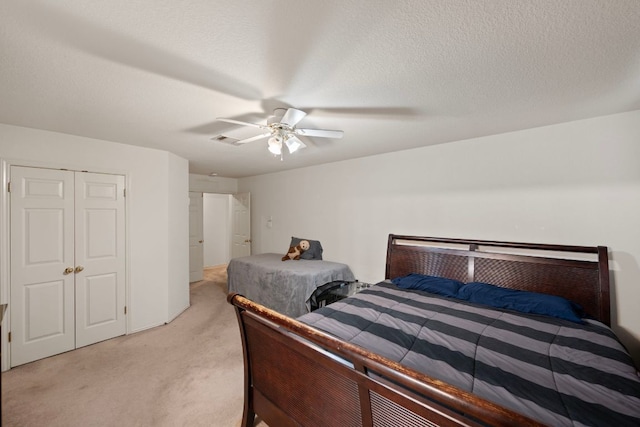 1207 Rolling Ridge Dr, Round Rock, TX 78665 - bedroom with light carpet, a closet, and ceiling fan