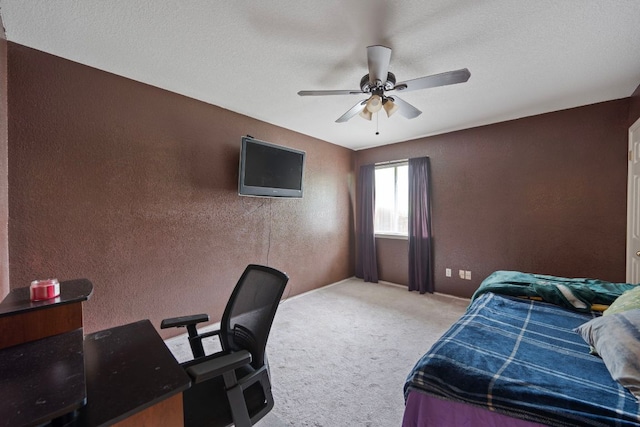 1207 Rolling Ridge Dr, Round Rock, TX 78665 - bedroom featuring carpet floors, a textured wall, ceiling fan, and an office area