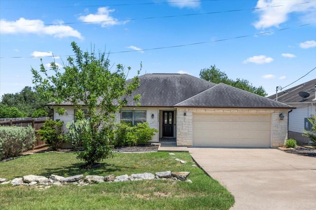 2003 Rain Water Dr, Austin, TX 78734 - ranch-style home featuring concrete driveway, a garage, stone siding, and roof with shingles