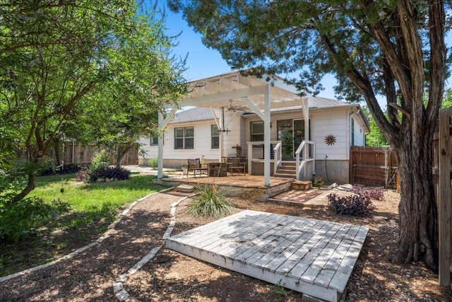 2003 Rain Water Dr, Austin, TX 78734 - back of house with a deck, a pergola, and a fenced backyard
