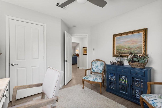 2003 Rain Water Dr, Austin, TX 78734 - sitting room featuring a ceiling fan and light wood-type flooring