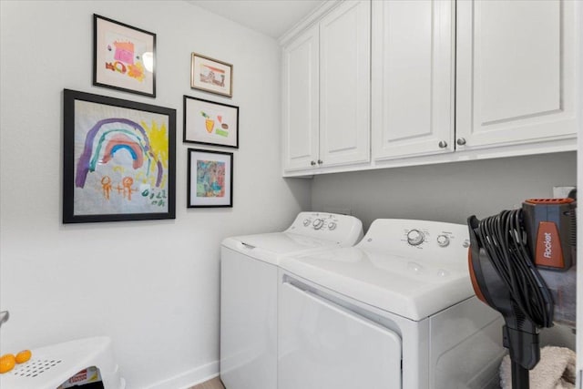 2003 Rain Water Dr, Austin, TX 78734 - laundry room with washing machine and dryer and cabinet space