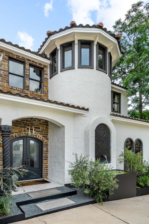 2621 Exposition Blvd, Austin, TX 78703 - view of front of house featuring french doors and stucco siding