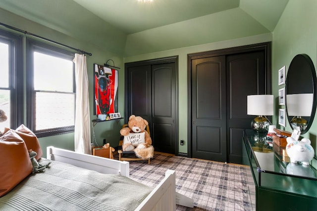 2621 Exposition Blvd, Austin, TX 78703 - carpeted bedroom featuring vaulted ceiling