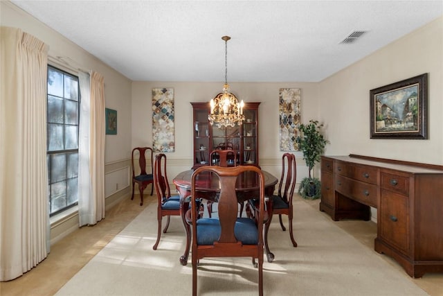 6203 Shadow Mountain Cv, Austin, TX 78731 - dining space with a chandelier and light carpet
