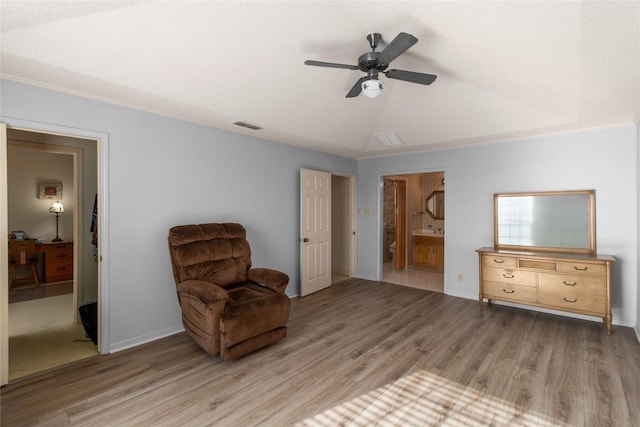 6203 Shadow Mountain Cv, Austin, TX 78731 - sitting room with wood finished floors, a ceiling fan, and lofted ceiling