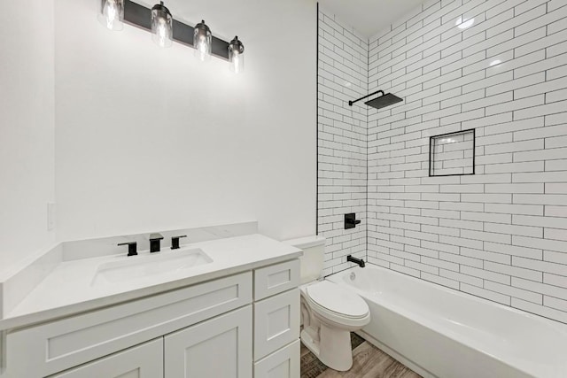 4190 W Fm 243, Bertram, TX 78605 - bathroom with toilet, vanity,  shower combination, and wood finished floors