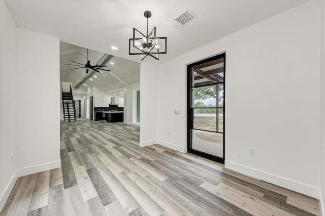 4190 W Fm 243, Bertram, TX 78605 - unfurnished dining area with a chandelier, light wood-style flooring, lofted ceiling, baseboards, and recessed lighting