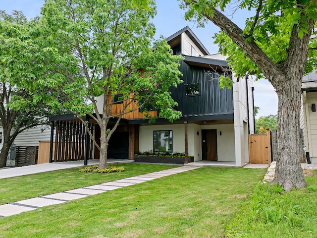 1805 Frazier Ave, Austin, TX 78704 - modern home featuring a gate, stucco siding, and concrete driveway