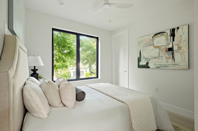 1805 Frazier Ave, Austin, TX 78704 - bedroom featuring wood finished floors, baseboards, and ceiling fan