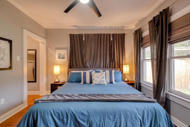 1706 Pennsylvania Ave, Austin, TX 78702 - bedroom featuring wood finished floors, ornamental molding, and ceiling fan