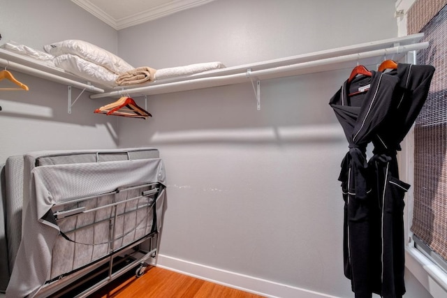1706 Pennsylvania Ave, Austin, TX 78702 - walk in closet featuring wood finished floors
