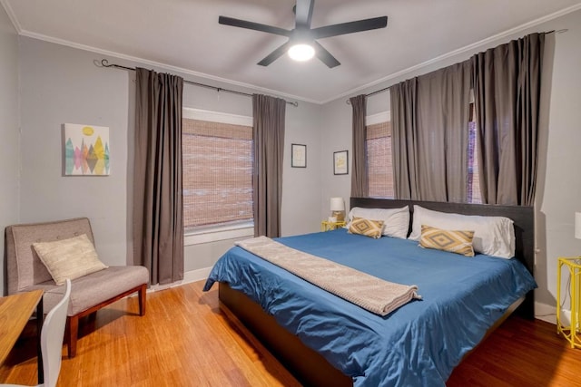1706 Pennsylvania Ave, Austin, TX 78702 - bedroom with wood finished floors, ornamental molding, and ceiling fan