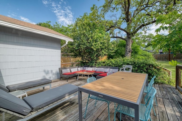 1706 Pennsylvania Ave, Austin, TX 78702 - wooden deck featuring an outdoor hangout area and a fenced backyard
