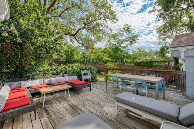 1706 Pennsylvania Ave, Austin, TX 78702 - wooden deck with outdoor dining area, a fenced backyard, and outdoor lounge area