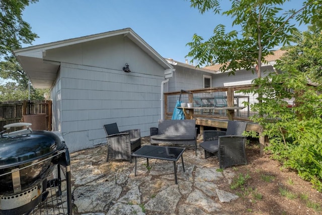 1706 Pennsylvania Ave, Austin, TX 78702 - rear view of house featuring a patio area, a wooden deck, and outdoor lounge area