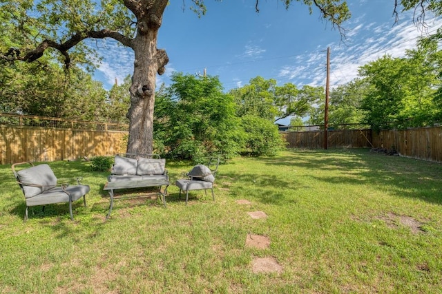 1706 Pennsylvania Ave, Austin, TX 78702 - fenced backyard featuring an outdoor hangout area