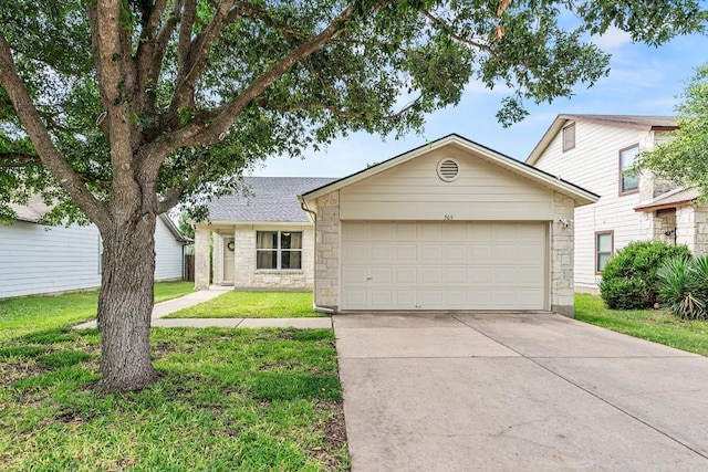 509 Big Bend Trl, Taylor, TX 76574 - view of front of property featuring driveway, a garage, a front yard, stone siding, and roof with shingles