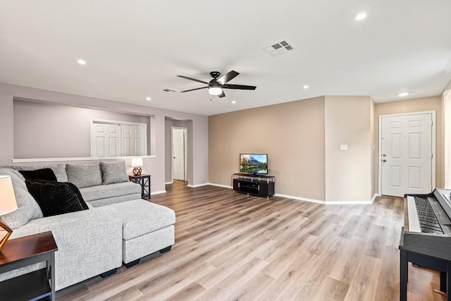 509 Big Bend Trl, Taylor, TX 76574 - living area featuring ceiling fan, light wood finished floors, recessed lighting, and baseboards