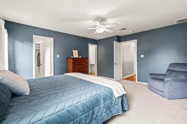 509 Big Bend Trl, Taylor, TX 76574 - carpeted bedroom featuring ceiling fan, baseboards, and a walk in closet