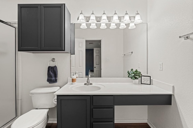 509 Big Bend Trl, Taylor, TX 76574 - bathroom featuring toilet, vanity, and a stall shower
