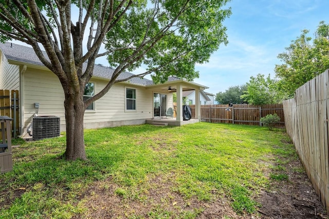 509 Big Bend Trl, Taylor, TX 76574 - view of yard featuring central AC, ceiling fan, and a patio area