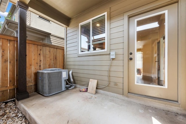 7706 Easy Wind Dr, Austin, TX 78757 - view of patio featuring cooling unit