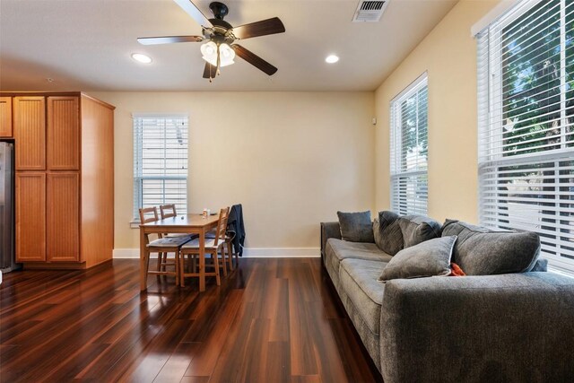 7706 Easy Wind Dr, Austin, TX 78757 - living area with dark wood-style flooring, a ceiling fan, baseboards, and recessed lighting