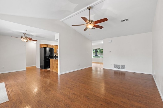 8407 Bargamin Dr, Austin, TX 78736 - unfurnished living room featuring a ceiling fan, lofted ceiling, wood finished floors, and baseboards