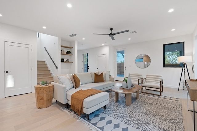 2704 Canterbury St Unit A, Austin, TX 78702 - living room featuring stairs, recessed lighting, light wood-style flooring, and a ceiling fan