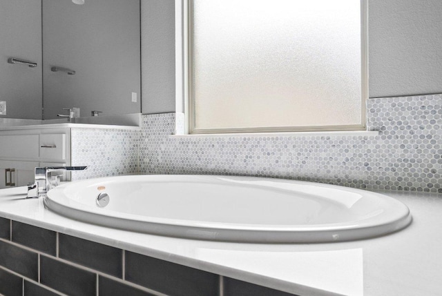 8108 Turning Leaf Cir, Lago Vista, TX 78645 - bathroom with a garden tub and vanity