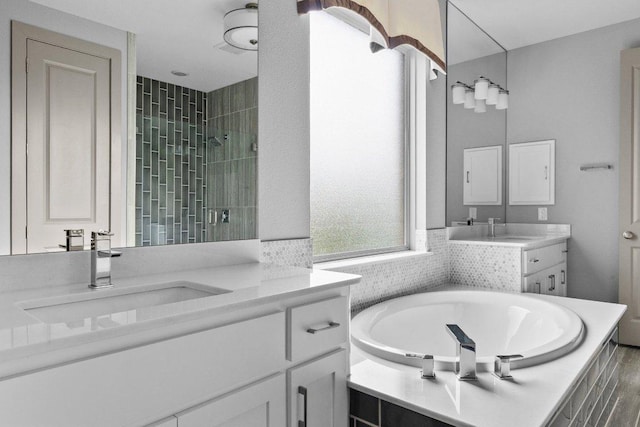 8108 Turning Leaf Cir, Lago Vista, TX 78645 - full bath featuring a bath, two vanities, and tiled shower