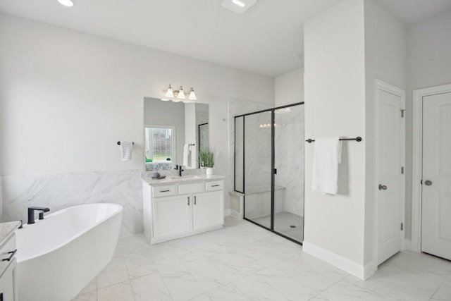 2436 Capestrano Cir, Round Rock, TX 78665 - full bathroom with marble finish flooring, vanity, a marble finish shower, and a freestanding bath
