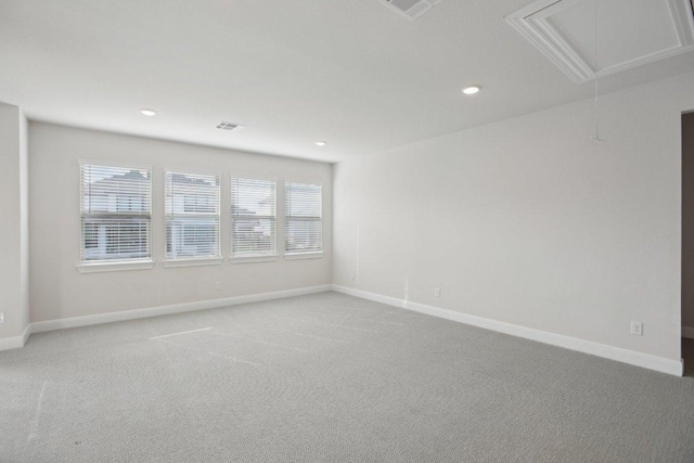 2436 Capestrano Cir, Round Rock, TX 78665 - spare room with attic access, carpet, and recessed lighting