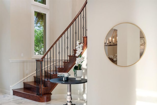 512 Newhall Cv, Austin, TX 78746 - stairway featuring baseboards