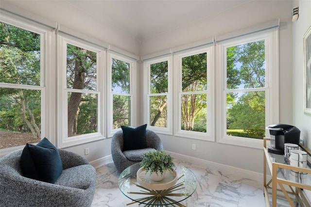512 Newhall Cv, Austin, TX 78746 - sunroom / solarium with marble look tiles, plenty of natural light, and baseboards