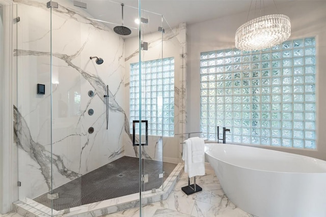 512 Newhall Cv, Austin, TX 78746 - bathroom featuring a soaking tub, marble tiled floors, a marble finish shower, and a chandelier