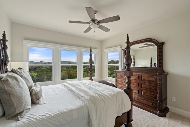 512 Newhall Cv, Austin, TX 78746 - bedroom with carpet floors, baseboards, and ceiling fan