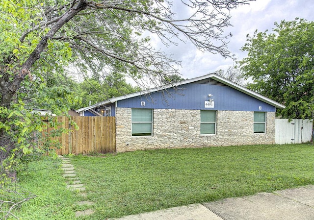 4401 Teri Rd, Austin, TX 78744 - view of home's exterior featuring stone siding