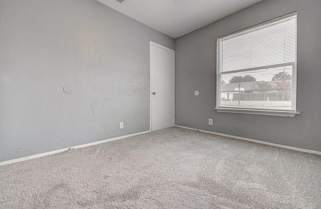 4401 Teri Rd, Austin, TX 78744 - carpeted empty room featuring baseboards