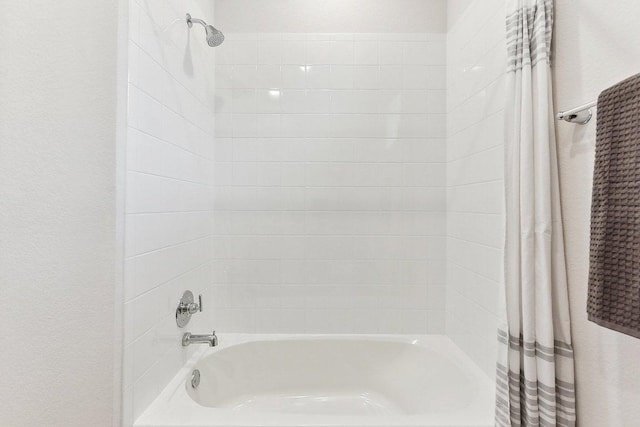 208 Charles Trl, Georgetown, TX 78626 - bathroom featuring shower / bath combination with curtain