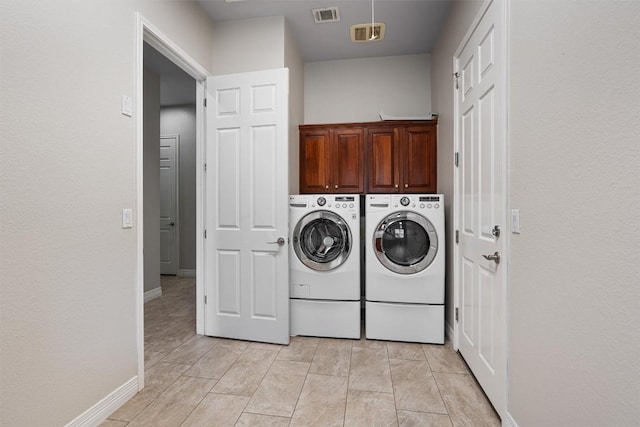 282 Trail Of The Flowers, Georgetown, TX 78633 - laundry room with independent washer and dryer, cabinet space, and baseboards