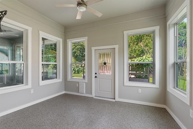 282 Trail Of The Flowers, Georgetown, TX 78633 - unfurnished sunroom featuring plenty of natural light