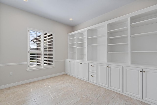 282 Trail Of The Flowers, Georgetown, TX 78633 - empty room with baseboards and recessed lighting