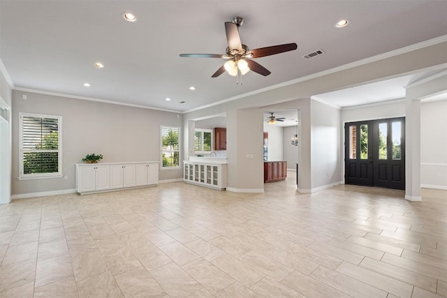 282 Trail Of The Flowers, Georgetown, TX 78633 - unfurnished living room featuring recessed lighting, a ceiling fan, baseboards, and ornamental molding