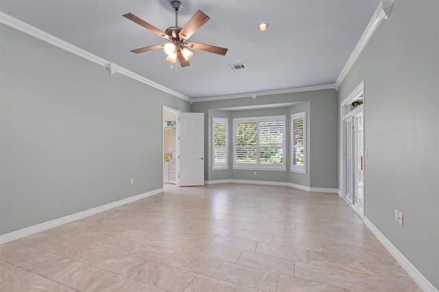 282 Trail Of The Flowers, Georgetown, TX 78633 - spare room featuring crown molding, a ceiling fan, and baseboards