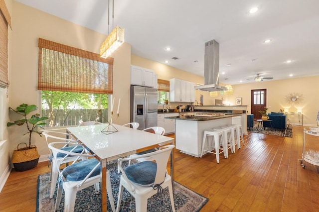 111 Adam L Chapa Sr St, Austin, TX 78702 - dining space with hardwood / wood-style floors, recessed lighting, ceiling fan, and baseboards