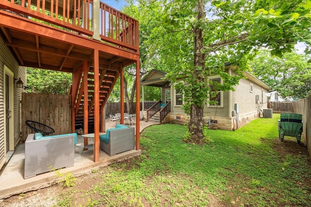 111 Adam L Chapa Sr St, Austin, TX 78702 - view of yard with stairway, central AC, a deck, and a patio