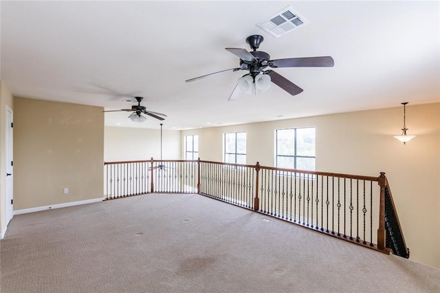 159 Catfish Cv, Dripping Springs, TX 78620 - carpeted spare room featuring a ceiling fan and baseboards
