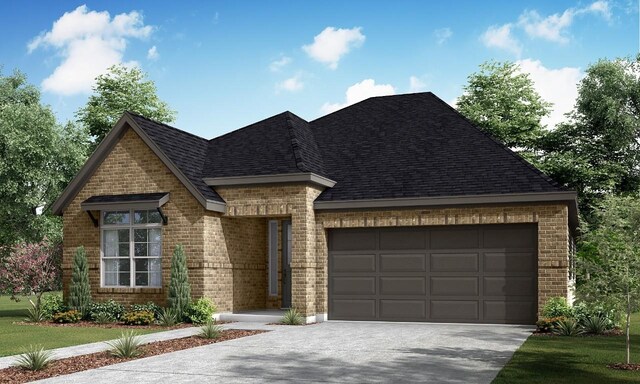 182 Grand Canyon Way, Kyle, TX 78640 - view of front facade with brick siding, concrete driveway, a garage, and a shingled roof